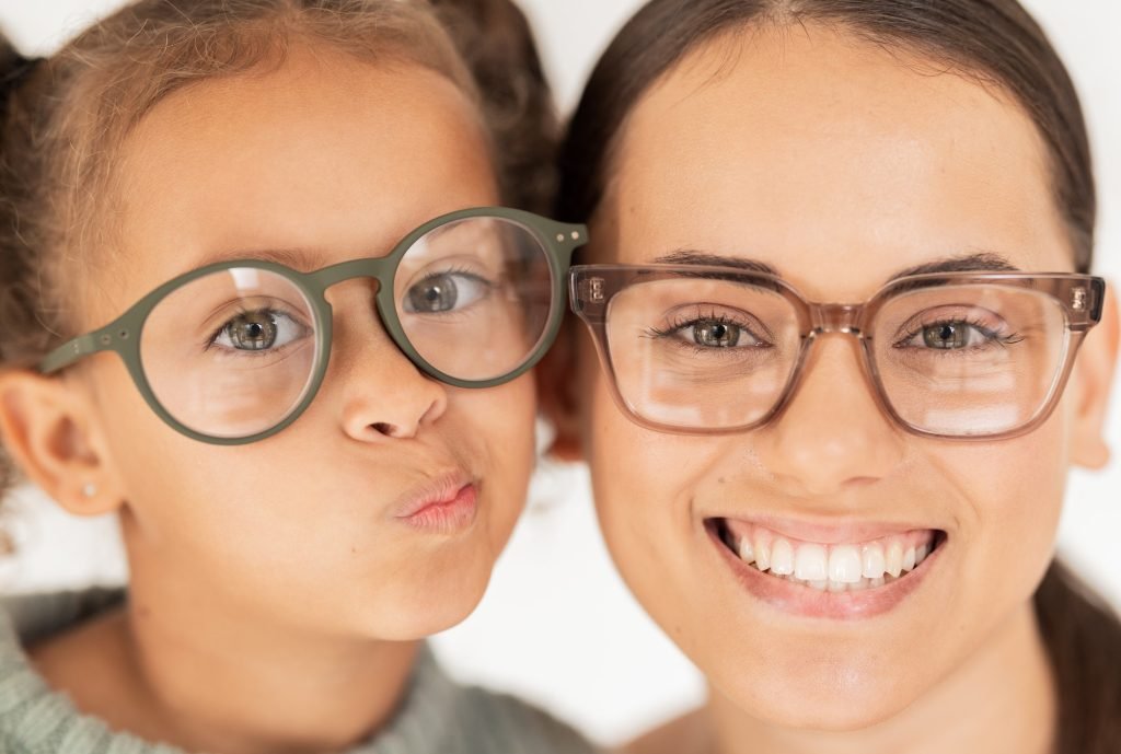 Family, optometry and eye care with glasses for mother and child together for vision, focus and eye